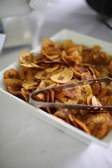 Catered Food Fried Plantains Dried Banana Chips in a Minimalistic White Bowl