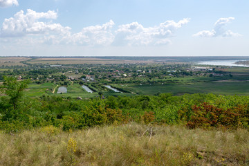 Landscape. Little village in the valley near the lakes