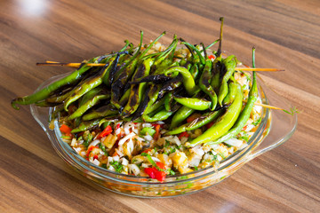 Roasted peppers on vegetarian salad
