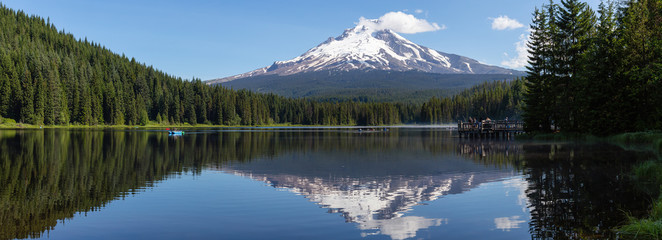 Beautiful Landscape View of a Lake with Mt Hood in the background during a sunny summer day. Taken from Trillium Lake, Mt. Hood National Forest, Oregon, United States of America. - Powered by Adobe