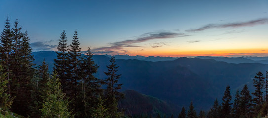 Fototapeta na wymiar Beautiful Panoramic View of American Mountain Landscape during a vibrant and colorful summer sunset. Taken from Sun Top Lookout, in Mt Rainier National Park, South of Seattle, Washington, USA.
