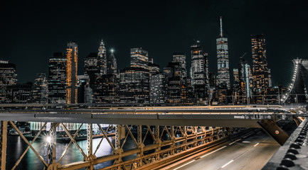 Fototapeta na wymiar Downtown Manhattan from the Brooklyn bridge at night no traffic on bridge