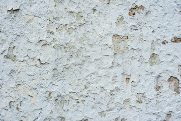 Texture of a concrete wall with cracks and scratches which can be used as a background