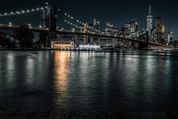Fototapeta na wymiar Brooklyn Bridge long exposure with downtown Manhattan