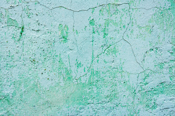 Texture of a concrete wall with cracks and scratches which can be used as a background
