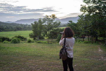 Portrait Travel Asian women Holding a camera