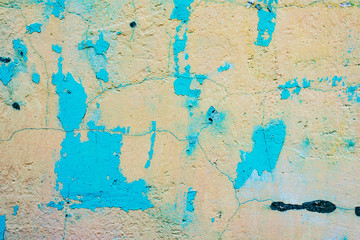 Texture of a concrete wall with cracks and scratches which can be used as a background