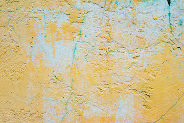 Texture of a concrete wall with cracks and scratches which can be used as a background