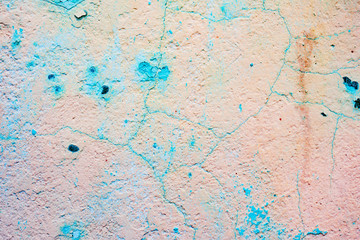 Texture of a concrete wall with cracks and scratches which can be used as a background