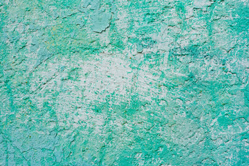 Texture of a concrete wall with cracks and scratches which can be used as a background