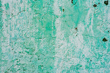 Texture of a concrete wall with cracks and scratches which can be used as a background