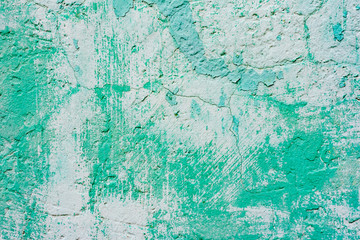 Texture of a concrete wall with cracks and scratches which can be used as a background