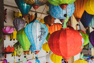 Fototapeta na wymiar Asian silk lanterns. Colored vietnamese silk lanterns.