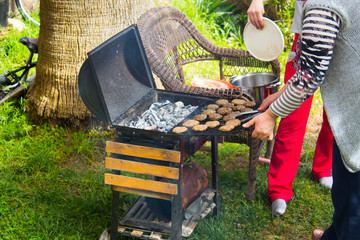 Meat and vegetables cooked on a barbecue