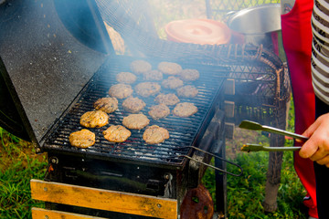 Meat and vegetables cooked on a barbecue