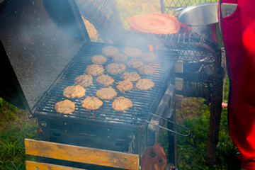 Meat and vegetables cooked on a barbecue