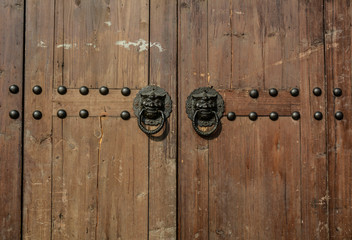 Wooden door at ancient building