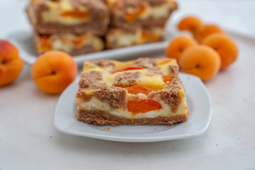 home made apricot cheesecake with chocolate crumble