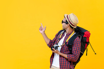 Asian backpacker being enjoyed with his travelling - obrazy, fototapety, plakaty