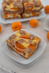 home made apricot cheesecake with chocolate crumble