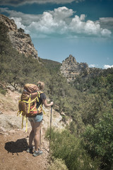 Girl hiker with backpack in a Crimea