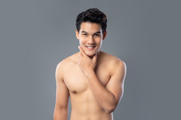 Fototapeta premium Portrait of shirtless smiling handsome Asian man