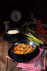 colorful turkey fricassee with asparagus and paprika
