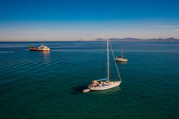 Amazing view to Yacht sailing in open sea at windy day.