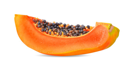 half of ripe papaya fruit with seeds isolated on white background.
