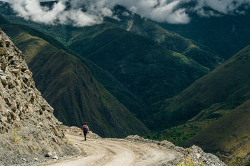 View bus gravel road to mountains Machu Picchu