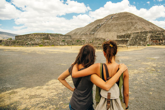 Young Girls On The Pyramid Overlooking Teotihuacan At The Sunset