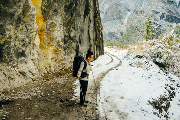 Hiking in Himalaya. Woman Traveler in the Mountains