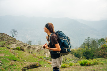 Hiking in Himalaya. Woman Traveler in the Mountains