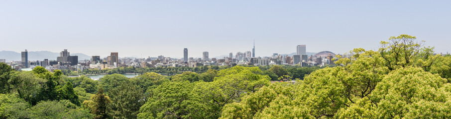 Fototapeta na wymiar Skyline Panorama of Fukuoka (Hakata) and Ohori Park take from Castle. Chuo-ku, Fukuoka, Japan, Asia.