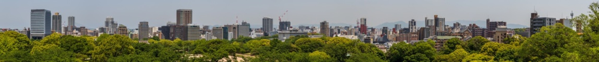 Fototapeta na wymiar Large Skyline Panorama of Fukuoka (Hakata) and Ohori Park take from Castle. Chuo-ku, Fukuoka, Japan, Asia.