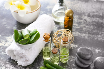 Spa composition with aloe vera on dark background