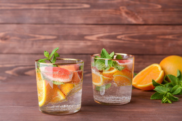 Glasses of fresh infused water on table