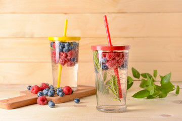 Glasses of fresh infused water on table