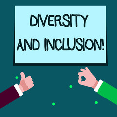 Word writing text Diversity And Inclusion. Business photo showcasing range huanalysis difference includes race ethnicity gender Two Businessmen Hands Gesturing the Thumbs Up and Okay Sign for