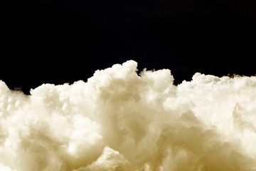 White clouds on a black background.