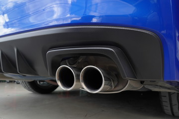 Obraz na płótnie Canvas Race car's exhaust pipe design
