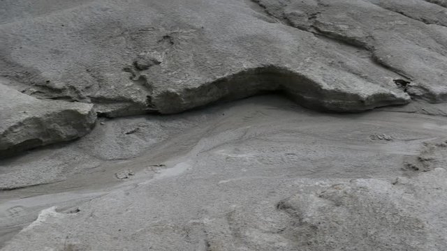 Abstract rough dry shape created by wind and water pan shot on abandoned kaolin quarry.