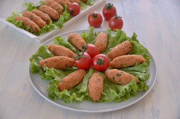 salad with lentil patties and tomatoes