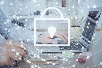 Double exposure of lock icon with man working on computer on background. Concept of network security.