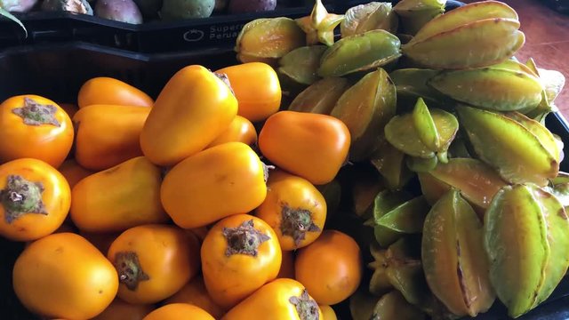 Carambola and cocona fruits exposed in a box in a supermarket ready to sell