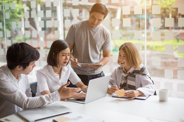 Start-up Asia business team in meeting and helped analyze the marketing problems of the company. Start up concept