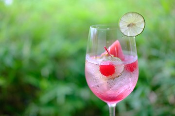 glass of wine on grass