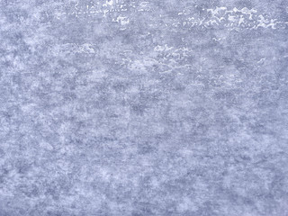 Texture of blue wallpaper with a pattern. Silver paper surface, structure closeup.