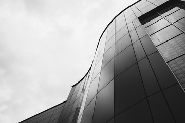 modern office building with a curved facade. black and white image