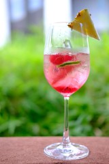 summer drinks alcoholic cocktails in wine glasses